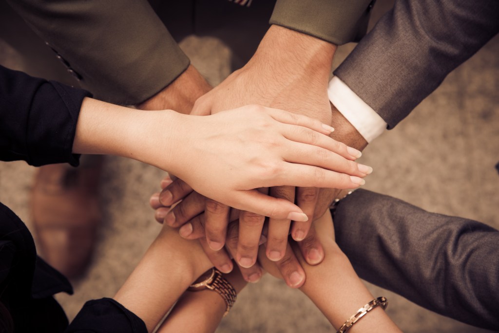 vecteezy_business-people-hands-assemble-corporate-in-meeting-and-teamwork_3446508.jpg